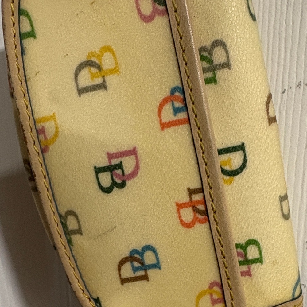 Dooney & Bourke DB Patterned Wristlet - Picture 7 of 7